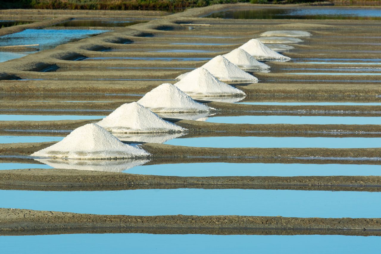 The Art of Drawing Readers In: Your attractive post title goes here Aerial view of salt piles at the famous Guérande salt marshes in France.